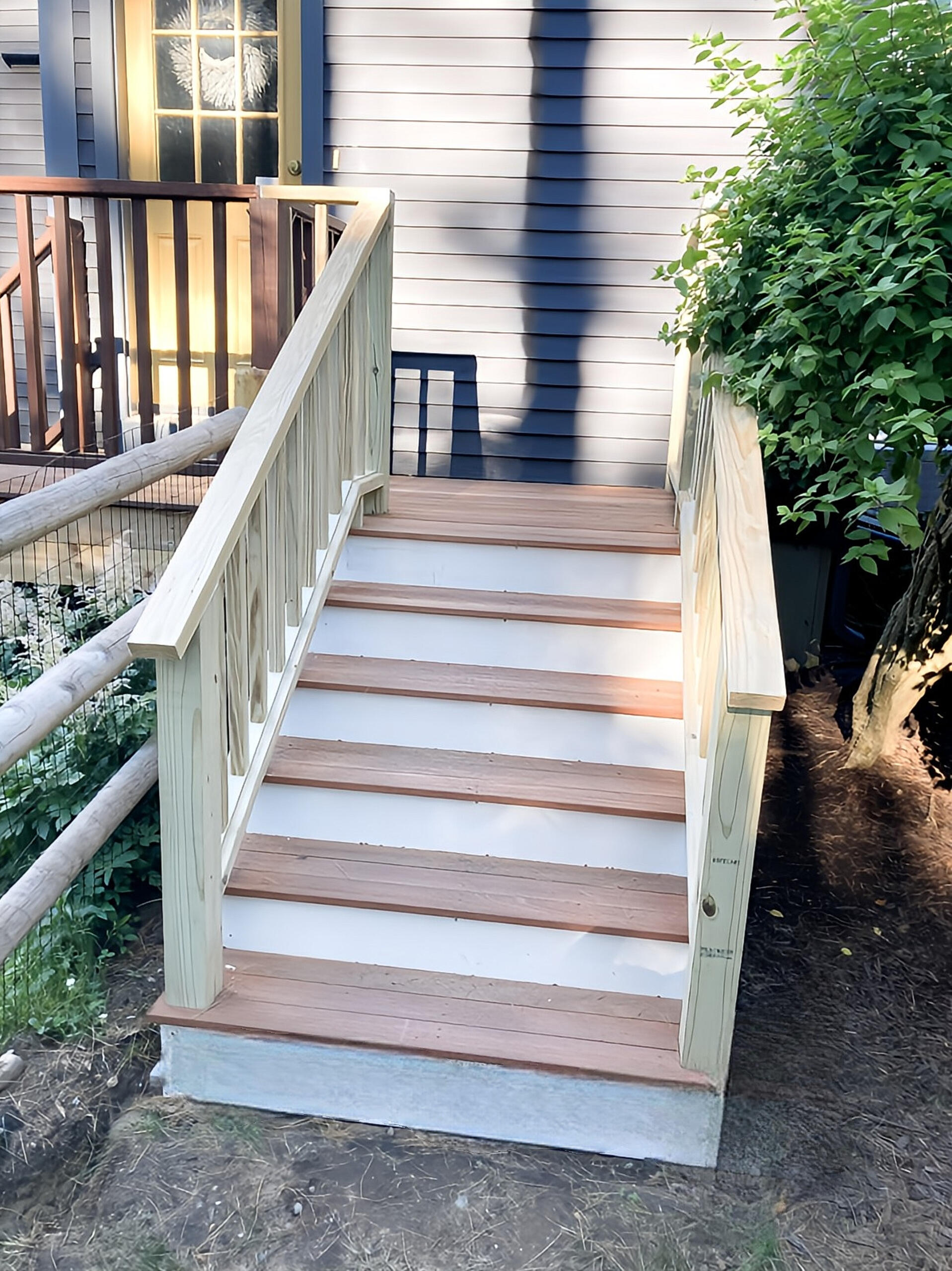 Wooden deck and staircase Wooden deck and staircase, custom to enhance your home.